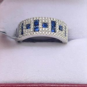 Diamond & Sapphire Ring In 18k White Gold.